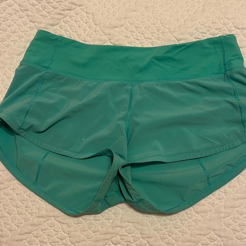 Lululemon speed ups teal size 4 with 2.5 inch inseam